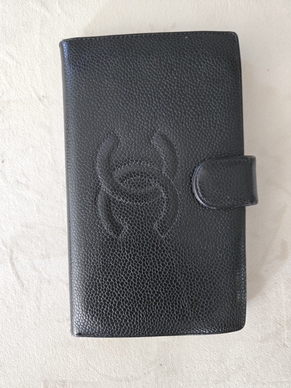 CHANEL Black Quilted Caviar Leather Wallet with Signature CC Emboss